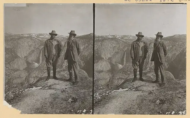 A stereoscopic 1903 photograph of Theodore Roosevelt with naturalist John Muir on Glacier Point, overlooking Yosemite Valley.
