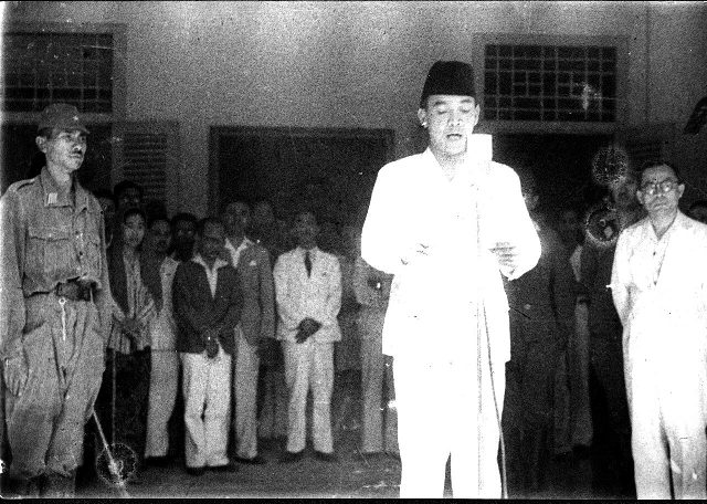 Sukarno reading the Indonesian independence proclamation in Jakarta on August 17, 1945, with Mohammad Hatta standing at his right.