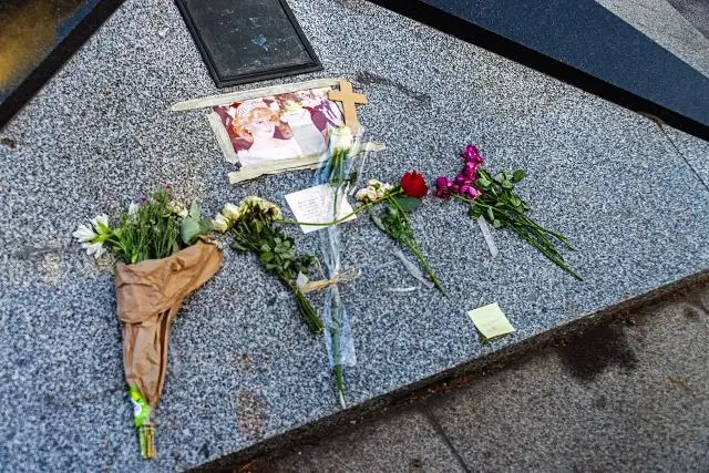 Flowers, photographs, and notes left in tribute to Diana, Princess of Wales, at the Flame of Liberty memorial above the Pont de l'Alma tunnel in Paris.