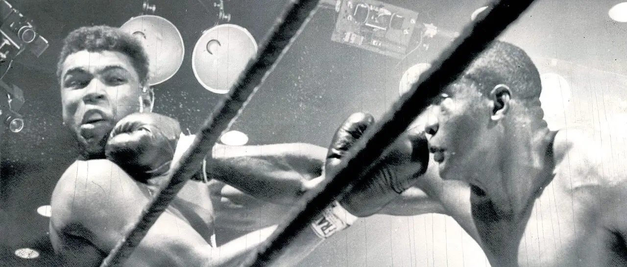 Sonny Liston landing a punch on Cassius Clay during their February 25, 1964 heavyweight title fight in Miami Beach