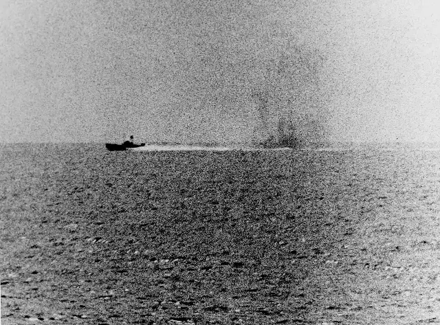 A North Vietnamese torpedo boat under fire during the August 2, 1964, clash with the USS Maddox in the Gulf of Tonkin.
