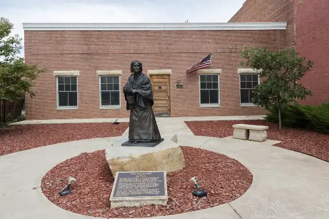 The bronze statue "The Franchise" of Louisa Ann Swain in the plaza outside the Wyoming House for Historic Women in Laramie.