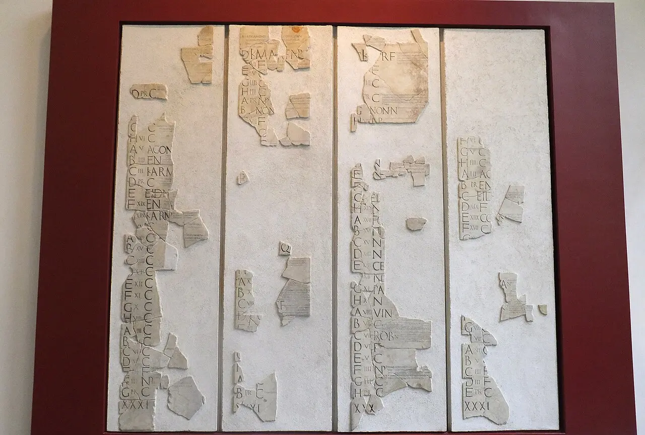 Fragments of the Fasti Praenestini, an ancient Roman calendar inscribed on stone, displayed at the Museo Nazionale Romano in Rome.