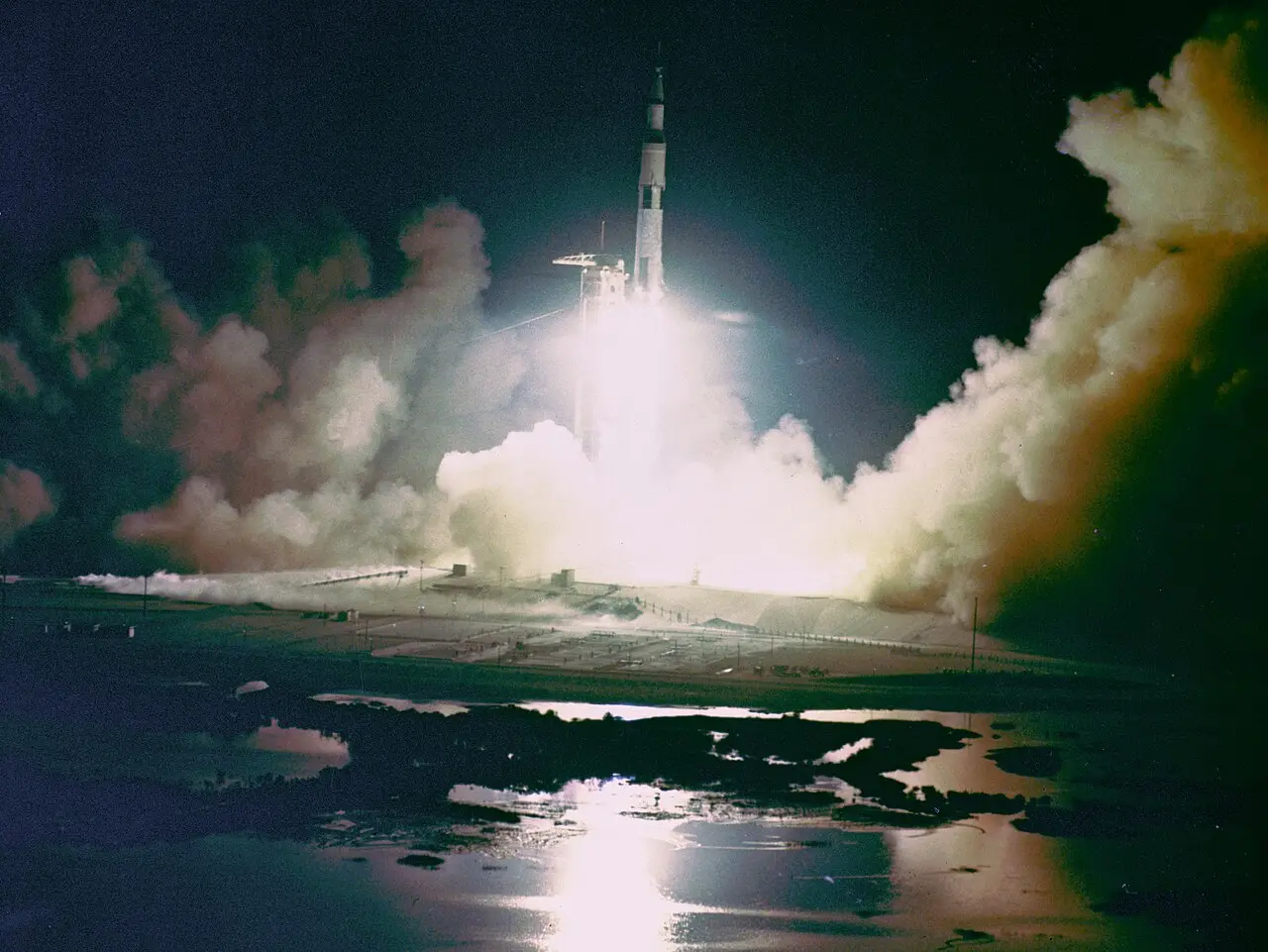 Apollo 17's Saturn V rocket lighting up the night sky as it lifts off on December 7, 1972