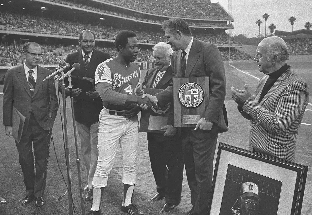 Hank Aaron in his Braves uniform being honored by Los Angeles officials at Dodger Stadium in May 1974, weeks after his record 715th home run.