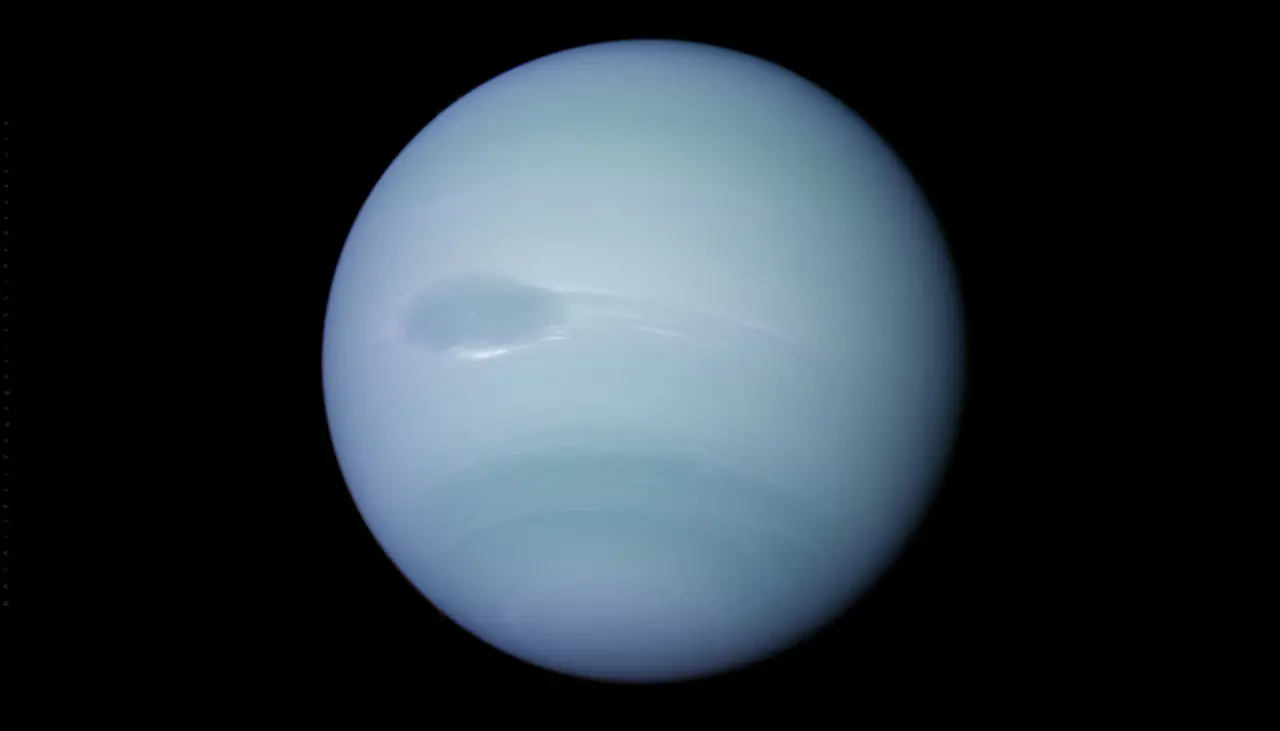 Neptune photographed by NASA's Voyager 2 spacecraft in 1989, showing the Great Dark Spot storm