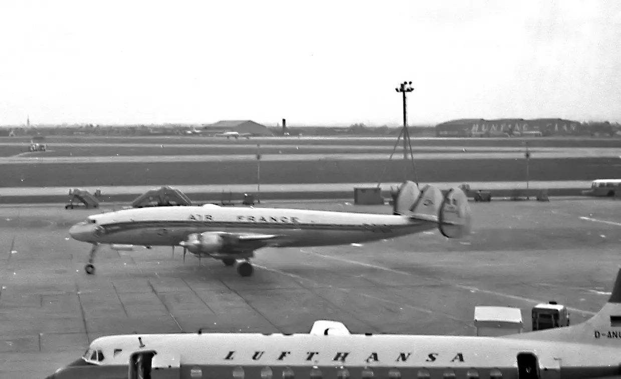 An Air France Lockheed Constellation and a Lufthansa Vickers Viscount on the tarmac at London Heathrow Airport in 1960.