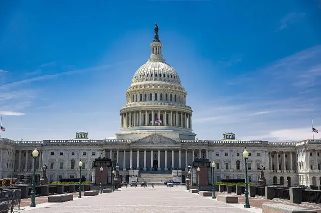 The east front of the U.S. Capitol building in Washington, D.C., under a clear blue sky