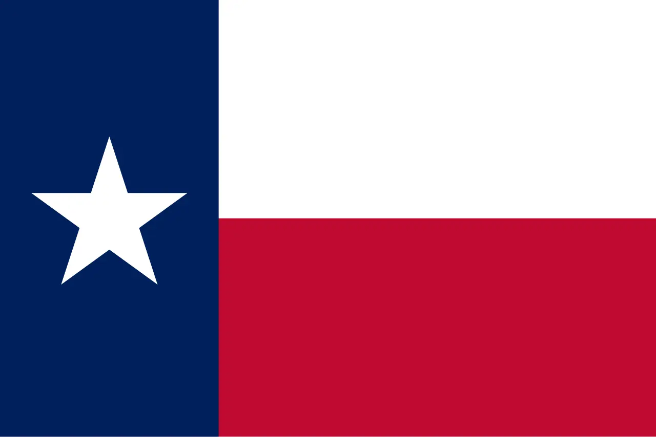 The flag of Texas: a single white star on a blue vertical field beside horizontal white and red stripes
