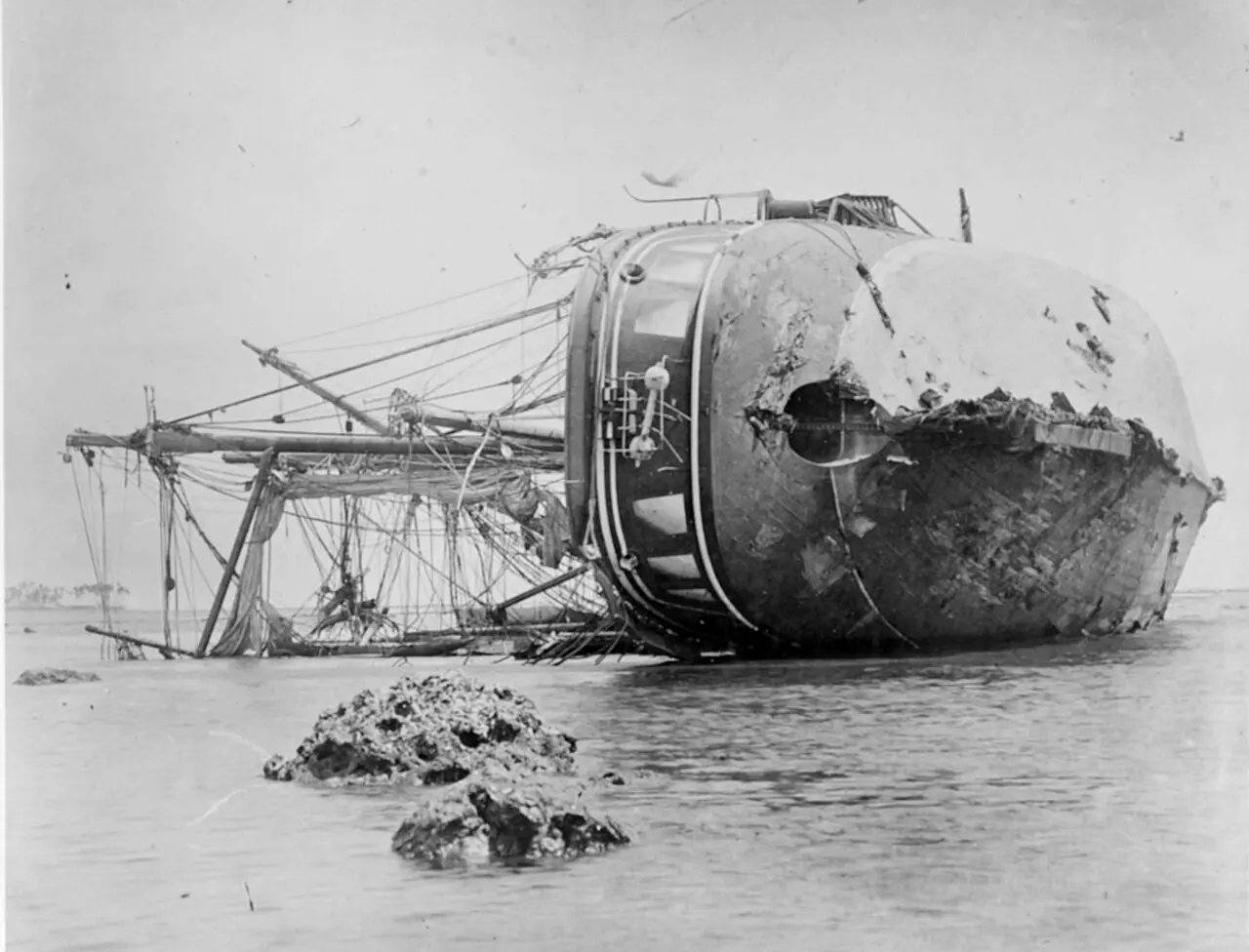 The German warship SMS Adler lying wrecked on the reef at Apia after the 1889 cyclone