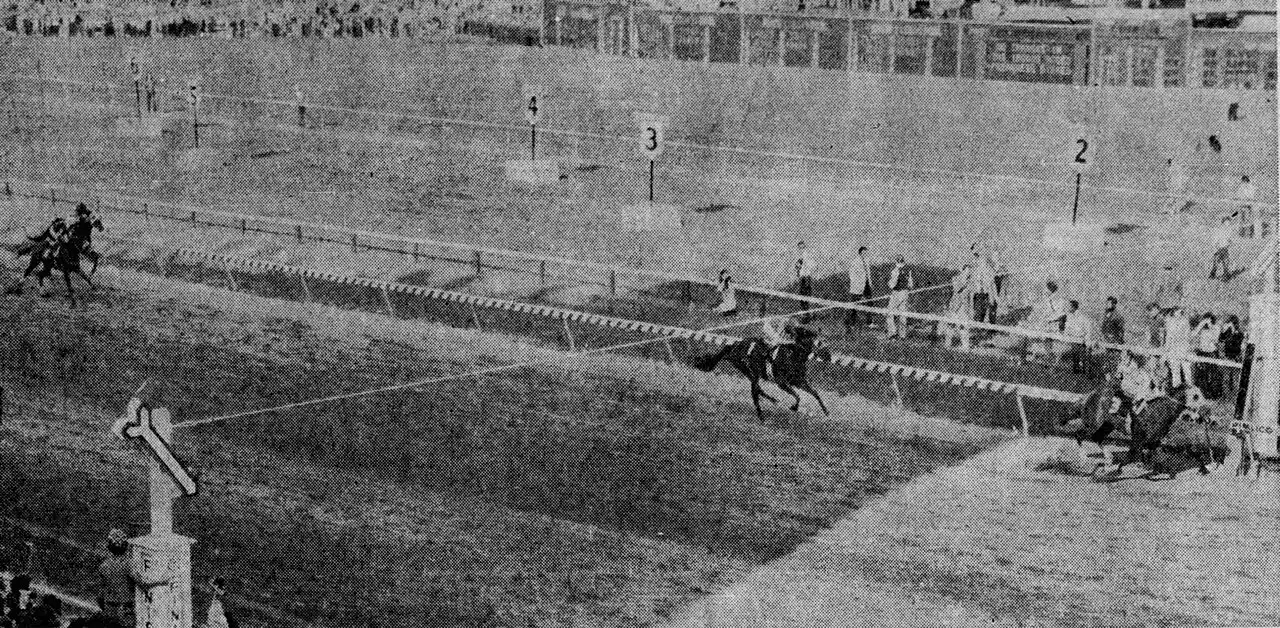 Aerial photo of Secretariat crossing the finish line to win the 1973 Preakness Stakes, the second leg of his Triple Crown run.
