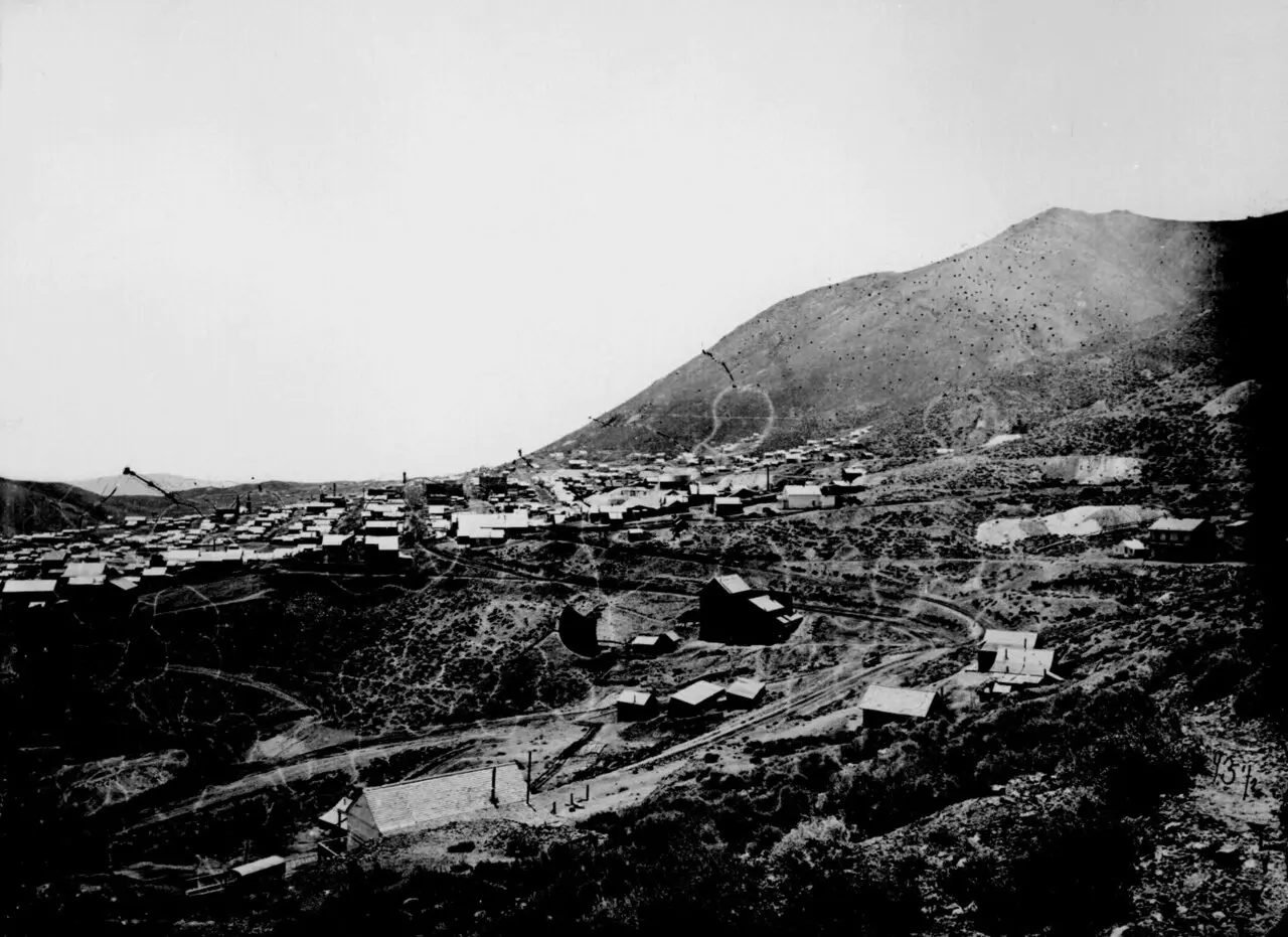Panoramic photograph of Virginia City, Nevada, in 1867–68: a dense mining town of wooden buildings and mine works spread across the hillside