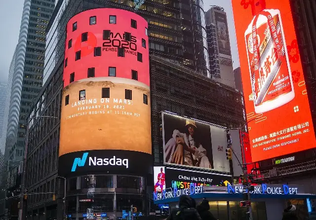 The Nasdaq MarketSite tower screen in Times Square, New York, displaying a NASA Mars 2020 message in 2021.