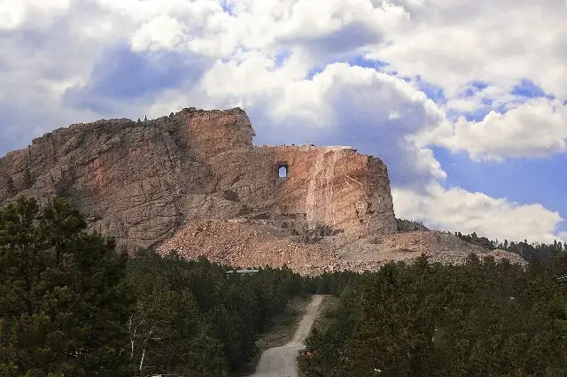 The Crazy Horse Memorial mountain sculpture under construction in the Black Hills of South Dakota.
