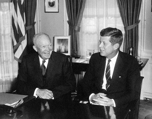 President Dwight D. Eisenhower meets with President-elect John F. Kennedy in the Oval Office during the 1960-61 presidential transition.