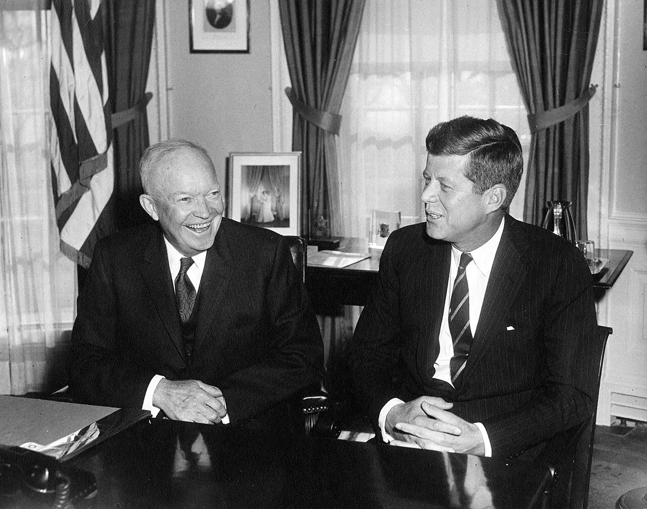 President Dwight D. Eisenhower meets with President-elect John F. Kennedy in the Oval Office during the 1960-61 presidential transition.
