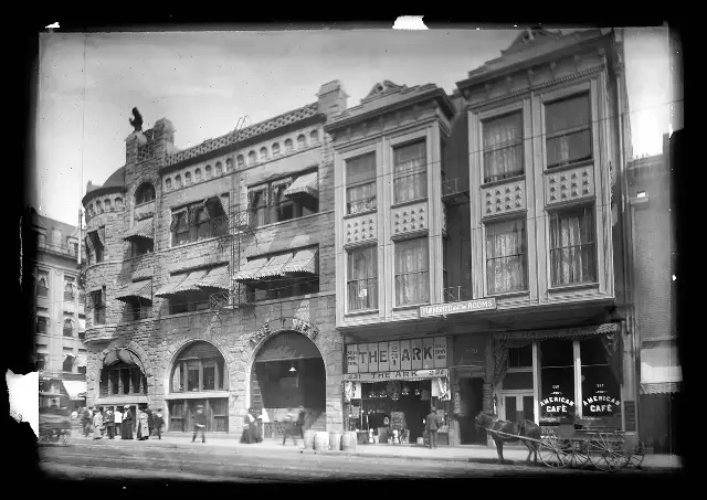 The Los Angeles Times building at First Street and Broadway, photographed around 1905, with the words THE TIMES carved over the arched entrance