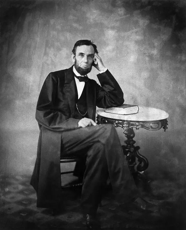 Seated photographic portrait of Abraham Lincoln by Alexander Gardner, taken in 1863 — an illustration, not an image of the 1865 assassination