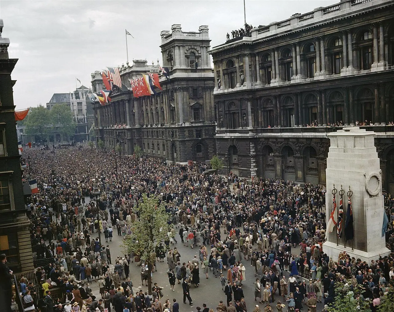 Crowds celebrating VE Day in Whitehall, London, on May 8, 1945, where the Prime Minister addressed the crowd from the Ministry of Health balcony.