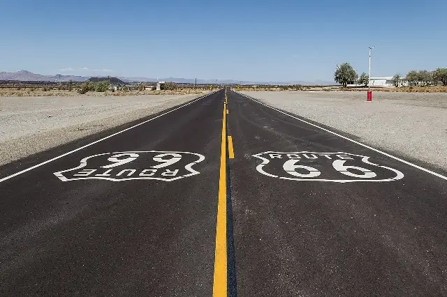 Historic Route 66 passing through the ghost town of Amboy, California, photographed in 2012 — the road was decommissioned in 1985