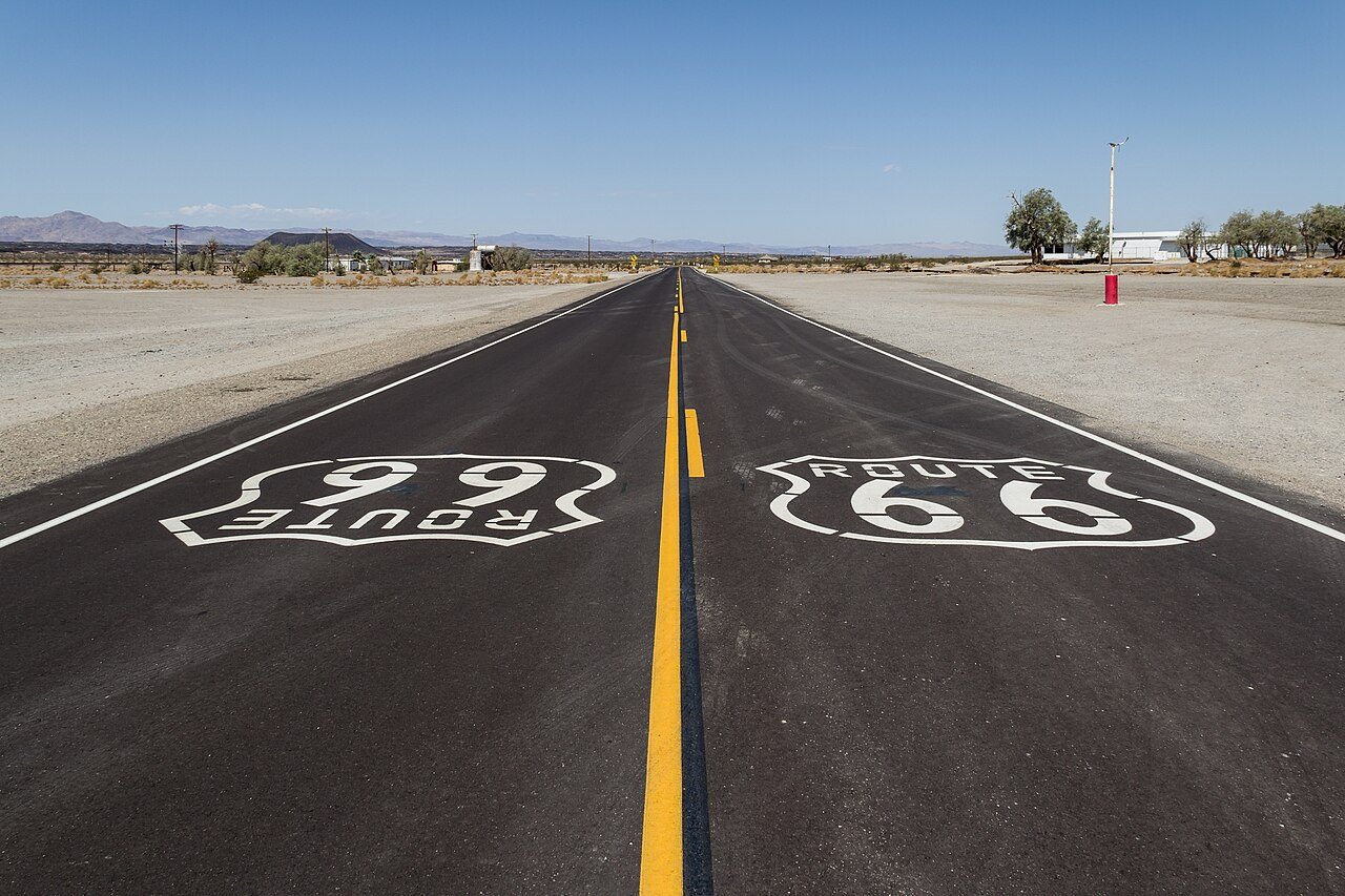 Historic Route 66 passing through the ghost town of Amboy, California, photographed in 2012 — the road was decommissioned in 1985