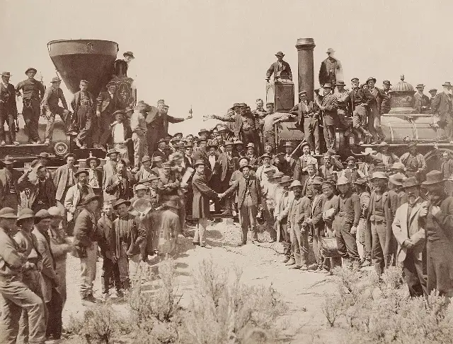 Andrew J. Russell's 1869 photograph of the golden spike ceremony at Promontory Summit, Utah, showing officials and workers around the two locomotives.