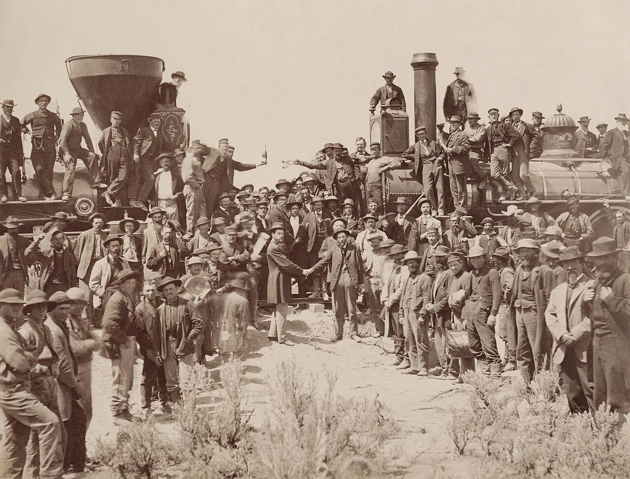 Andrew J. Russell's 1869 photograph of the golden spike ceremony at Promontory Summit, Utah, showing officials and workers around the two locomotives.