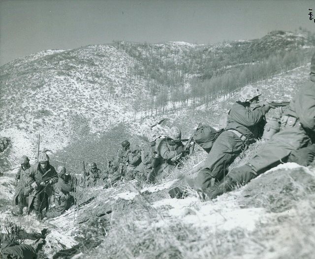 U.S. Marines in combat during the Korean War — a period U.S. Marine Corps photograph, not from the June 25, 1950 invasion itself.