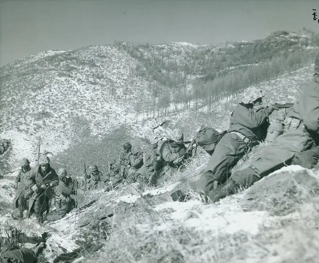 U.S. Marines in combat during the Korean War — a period U.S. Marine Corps photograph, not from the June 25, 1950 invasion itself.