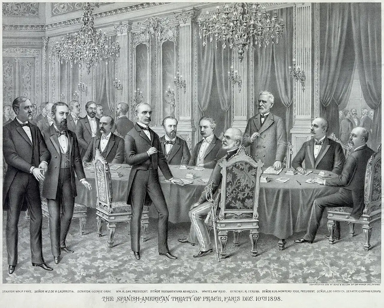 1898 chromolithograph of the signing of the Treaty of Paris, showing American and Spanish commissioners around a table.
