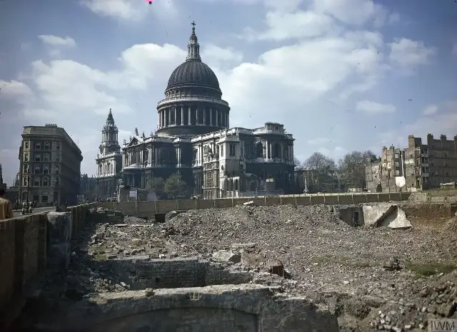 St Paul's Cathedral rising above bomb-damaged streets in London during the Second World War.
