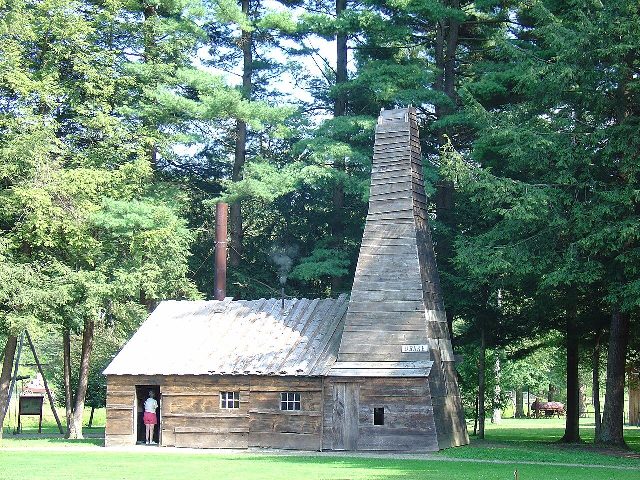 The reconstructed Drake Well derrick at the Drake Well Museum in Titusville, Pennsylvania — a replica of the 1859 well where Edwin Drake first struck oil.