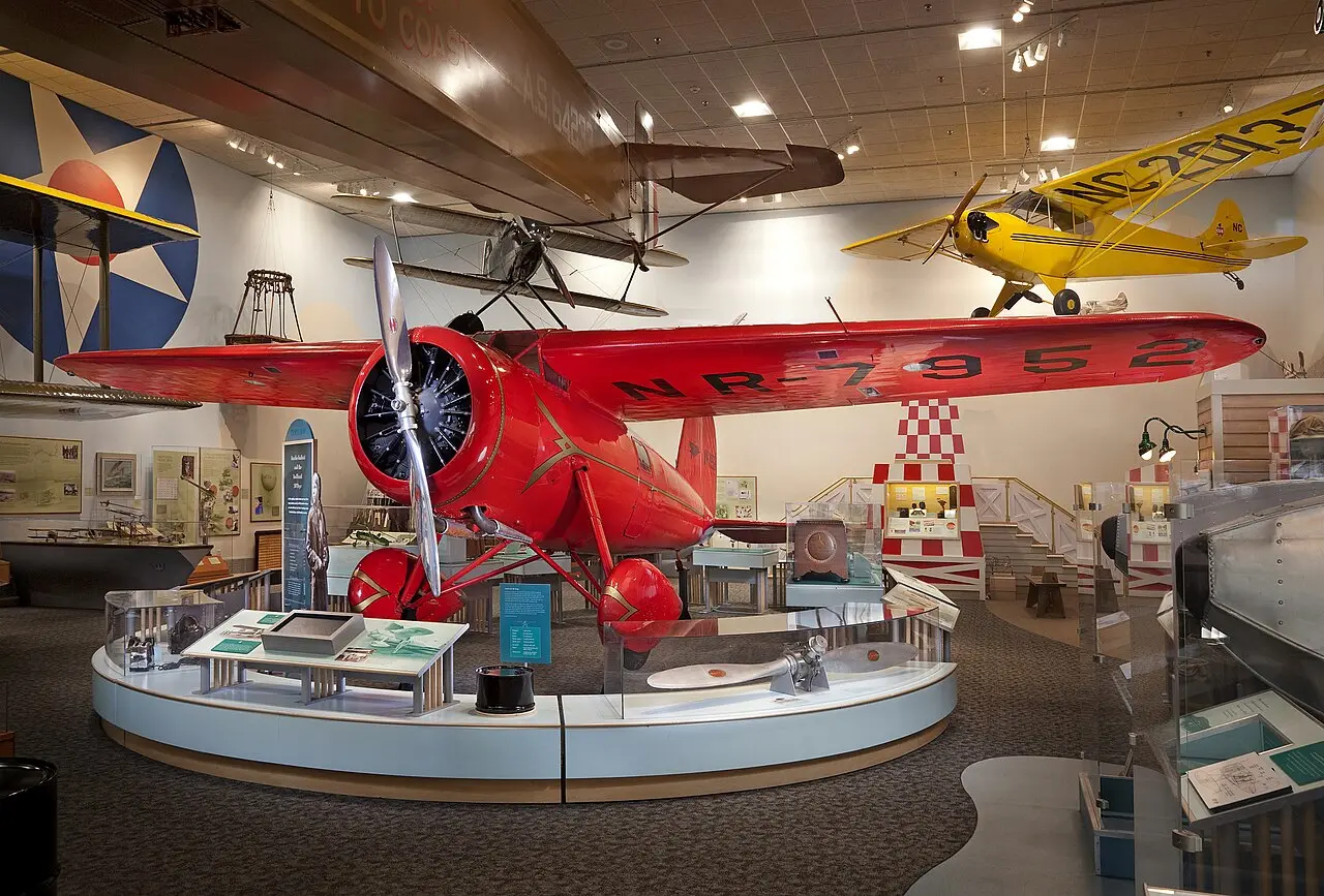Amelia Earhart’s red Lockheed Vega on display in a museum