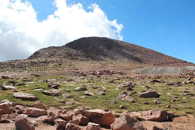 The rocky summit of Pikes Peak, Colorado, the view that inspired Katharine Lee Bates.