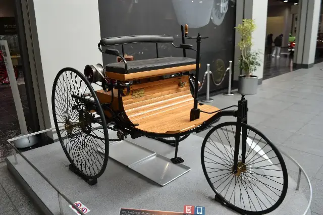 A replica of the 1886 Benz Patent-Motorwagen, the three-wheeled vehicle widely regarded as the first automobile.