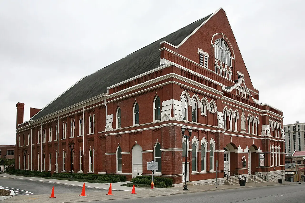 The Ryman Auditorium in Nashville, the red-brick former tabernacle that housed the Grand Ole Opry from 1943 to 1974 (modern photograph; the Opry debuted on radio in 1925, so the image is illustrative).