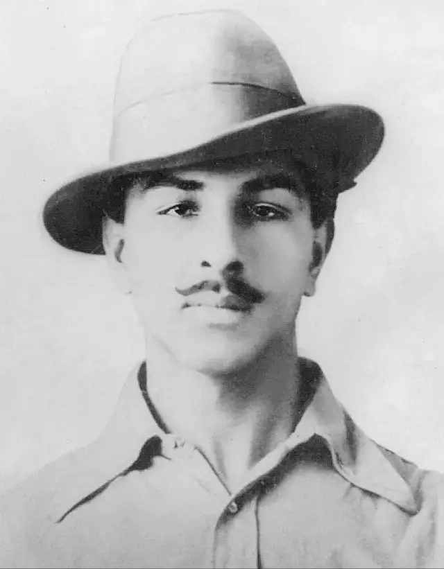 1929 studio portrait of Bhagat Singh wearing a hat.